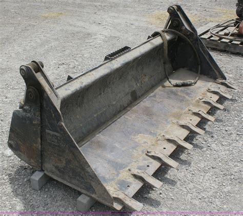 4 ft skid steer bucket|caterpillar 4 in 1 bucket.